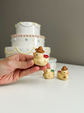 Load image into Gallery viewer, Cowboy &amp; Bread Head Ducky Cake Toppers
