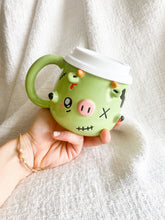 Load image into Gallery viewer, Lil Zombie Cow Travel Mug
